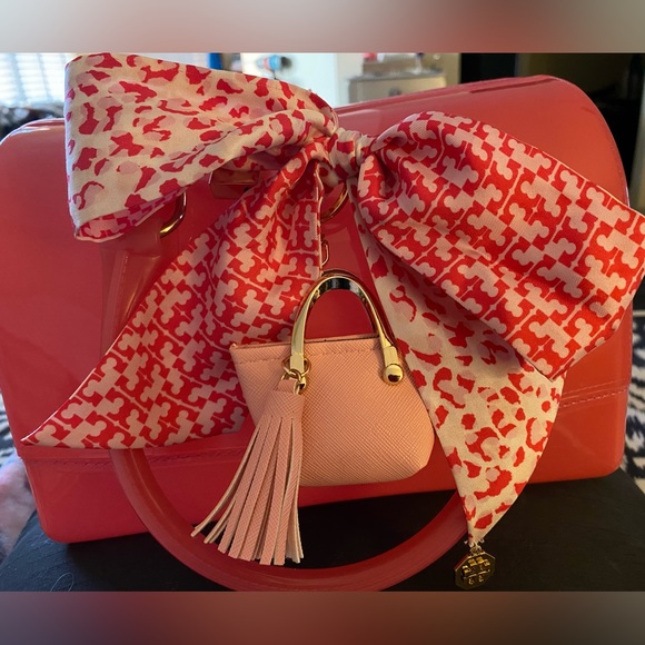 Tory Burch Accessories - Authentic Tory Burch twilly/scarf with pink bag charm w/ tassel, bag opens